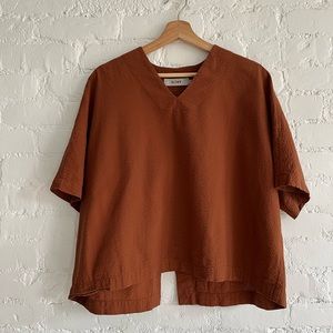 Kloke top in burnt orange